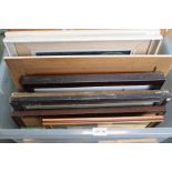 A box containing a selection of pictures to include original artworks