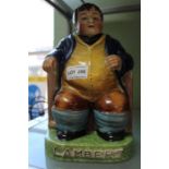 A polychrome pottery figure, depicting Daniel Lambert, England's fattest man