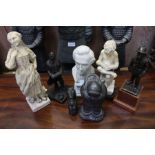 Seven various figurines, in a variety of medium