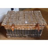 A large wicker costume basket with leather straps, ex: Stratford upon Avon Memorial Theatre