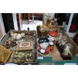 Two boxes of oriental figurines etc