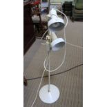 A white 1970's style standard lamp