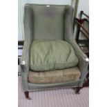 A late 19th century deep seated arm chair