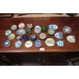 A collection of glass paperweights various.
