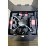 A box containing a EHANG Ghost Drone 2.0