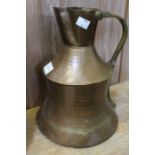 A vintage copper Middle Eastern jug