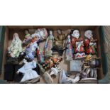 A box containing oriental figurines the majority p