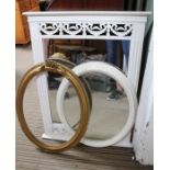 Two white framed plate wall mirrors