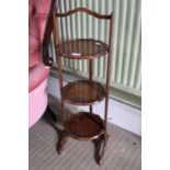 A Walnut Three tier folding cake stand