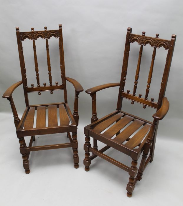 Pair of Ercol gold label open armchairs 110cm tall