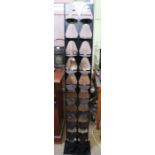 A pair of PERIGOT black finished free standing shoe racks