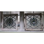 A pair of stained & leaded glass window panels