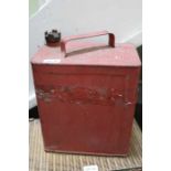 A red finished Shell petrol can