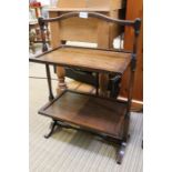 An oak folding two tier table / fire screen