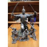 A free standing Samurai warrior surrounded by five smaller ninjas