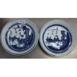 A pair of Oriental hand painted blue and white dishes