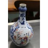 A 19th century Chinese vase with scenes of family life (stapled)