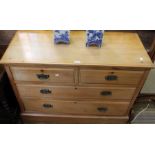 A satinwood four drawer chest
