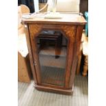 A Victorian inlaid music cabinet