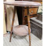 A late 19th century circular two tier table