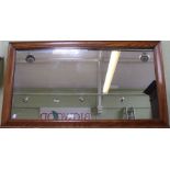 An oak framed rectangular plain plate wall mirror