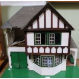 A Tri-ang doll's house, with contents various