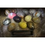 A selection of onyx and mineral turned egg specimens