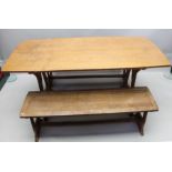 An English arts and crafts design three piece dining suite,