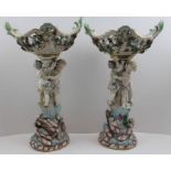 A pair of Meissen porcelain baskets on stands