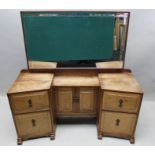 An English Arts and Crafts mixed wood dressing table