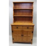 A mid 20th Century English Arts and Crafts design, quarter sawn oak dresser