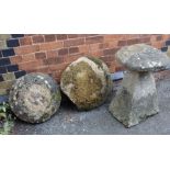 A tapering square form limestone staddle stone base & three caps