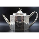 A George III silver teapot of serpentine form