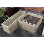 Two cast wooden plank effect planters, one square