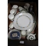 A box containing a Royal Doulton pastoral part tea service