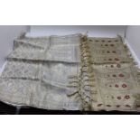 An Indian cream silk shawl, gold colour thread work embroidery of a floral paisley design,
