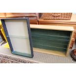 Two open fronted set of display shelves