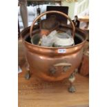 A copper finished three legged log bin, together with a scuttle, a pair of bellows, etc.