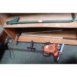 An Echo hedge cutter & a lawn edger, weed extractor