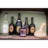 A shelf of beers and liqueurs to include Bass Royal Commemorative ale