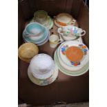 A box of Clarice Cliff, Susie Cooper and a Shelly bowl