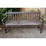 A painted teak, three person slatted bench