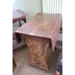 An arts & crafts quarter sawn oak twin flap table