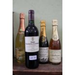 Chateau Cantemerle 1985, together with three bottles of fizz