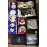 A collection of ceramic miniature tea sets