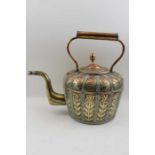 A late 19th century Indian copper & brass kettle,