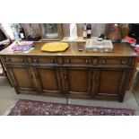 20th century oak sideboard, with four drawers over four cupboard doors