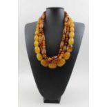 Two amber bead necklaces