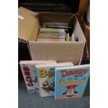 A collection of Beano, Dandy, Buster and Rupert annuals and books (28 items).