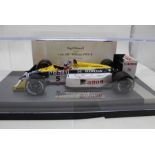 A diecast Legends Williams Honda FW11B Signed by Nigel Mansell 1:18 1978 Williams FW11B limited edit